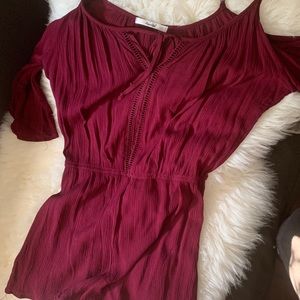 Crepe material cold shoulder romper. Color: wine
